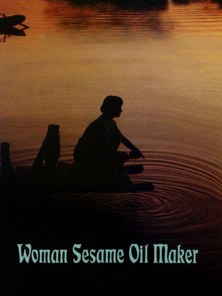 Woman sesame oil maker